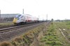 800002 trails 800001 through Marholm, near Peterborough, on April 11, with the 0836 Old Dalby-North Pole. The '800' carries Virgin Trains branding from the official opening of the Newton Aycliffe facility last September. ANDREW WRIGHT. 