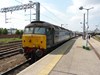 Direct Rail Services 47501 Craftsman stands at Norwich on July 12 2014, with the 1230 London Liverpool Street-Great Yarmouth. The '47' is now owned by Locomotive Services Ltd. RICHARD CLINNICK.