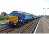 A freshly repainted Direct Rail Services 47841 stands at Great Yarmouth on August 3 2013, with the 1625 empty coaching stock to Norwich. RICHARD CLINNICK.