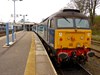 One of the original four Direct Rail Services Class 47s, 47802 Pride of Cumbria stands at Norwich on April 17 2014, with the 1036 to Great Yarmouth. The '47' is now part of the West Coast Railway fleet. RICHARD CLINNICK.