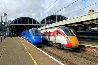 Private operator… and state-owned franchisee. Lumo 803002 (left) with the 1023 London King’s Cross to Edinburgh stands at Newcastle on February 26 2023, alongside LNER 801211 on the competing 1003 King’s Cross-Edinburgh. Despite Labour’s nationalisation plans, the government has been supportive of open access. PAUL BIGGS.