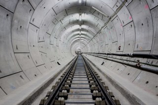 Rail and sleepers aligned in Thames tunnel prior to concrete track slab pour. CROSSRAIL LTD.