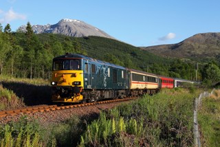 Caledonian Sleeper 73966 passes Torlundy, near Fort William, on May 31, with a London-bound sleeper. PHIL METCALFE.