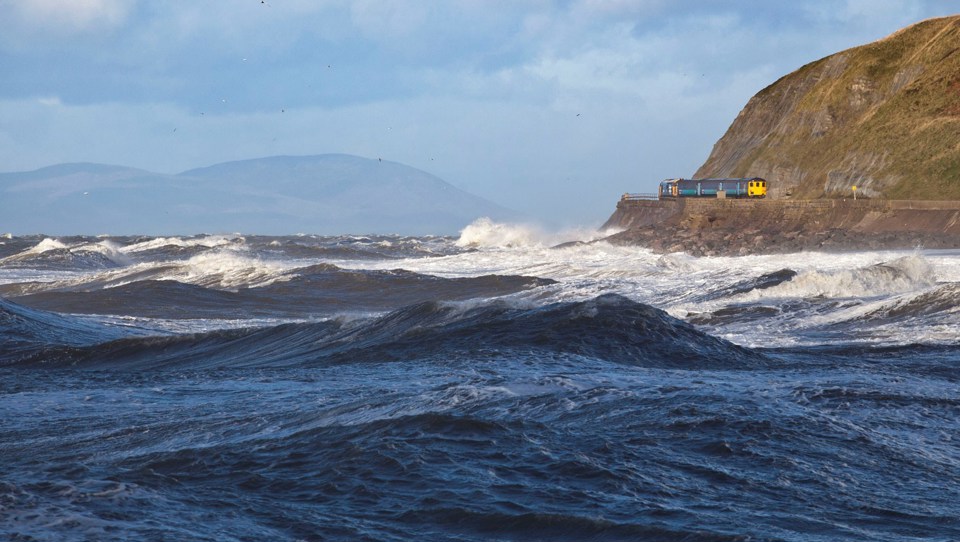 DRS 37401 hauls Northern Rail's 1138 Barrow-Carlisle approaching Micklam Point, as it makes its way round Lowca Sea Brows on November 13. DAVE MCALONE.