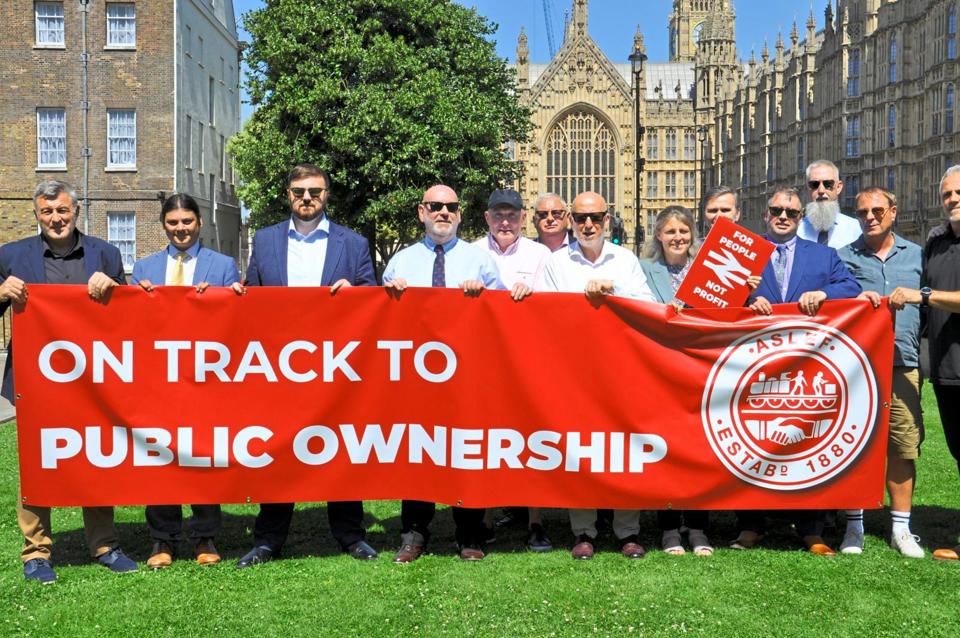 ASLEF executives and supporting MPs gather on July 29 outside Parliament on College Green, to mark the second reading of the Passenger Railway Services (Public Ownership) Bill later that day.