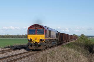 DB Cargo UK's 66170, in EWS livery, near Worlaby with the 1658 Immingham BSC Ore Terminal-Santon FOT on April 16. BRIAN HALL.
