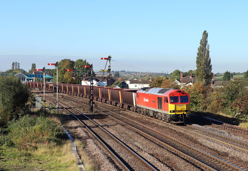 DB Schenker 60019 on empty steel wagons at Barnetby East. TOM MCATEE.