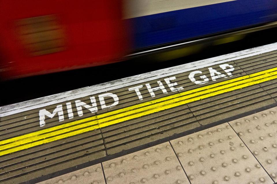 London Underground Mind the Gap warning on platform edge. ALAMY