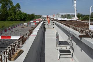 Looking along one of the twin precast beams that make up the viaduct. Seen before the beams are jointed or the deck panels lifted into place. PAUL BIGLAND