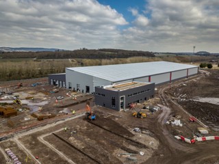 An aerial view of CAF’s structurally complete factory near Newport. CAF.