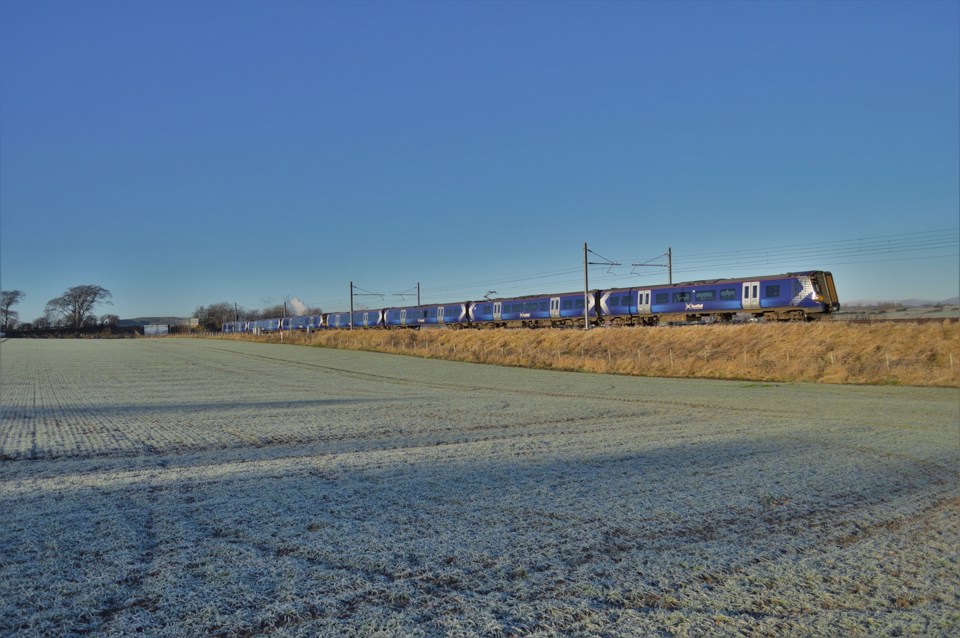 ScotRail 380114 and 380004 pass Park Farm with the 1200 Glasgow Queen Street High Level-Edinburgh Waverley via Falkirk High on December 10. STEVEN FRASER.