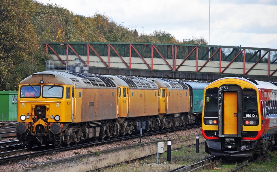 57312/301/306 approach Basingstoke hauling two Arlington barrier coaches as the 0958 Peterborough-Eastleigh Works on November 5 2013. MARK PIKE.