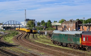 DCRail 31452 and 56303 are stabled as Colas Rail 37099 propels a Crewe-Derby test train into Derby on May 20. PAUL ROBERTSON.