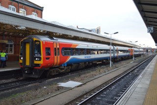 East Midlands Trains 158864 and 158810 at Nottingham on December 18, with the 0550 Norwich-Liverpool. RICHARD CLINNICK.