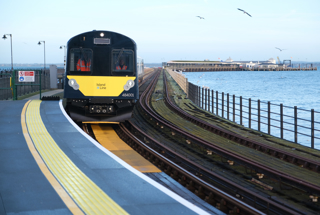 An Island Line Class 484 comes off Ryde Pier. SOUTH WESTERN RAILWAY.