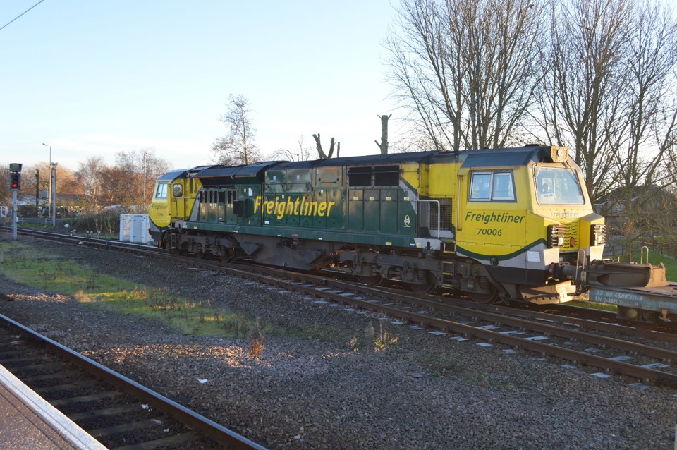 Freightliner 70006 stands at Ely with an intermodal train from Felixstowe. RICHARD CLINNICK.