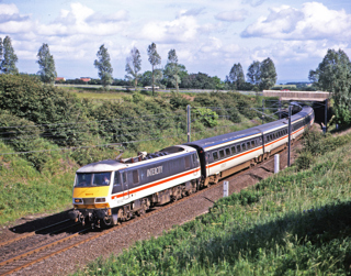 In InterCity livery, 90022 nears Aycliffe on June 16 1992. It is the first of the class to be scrapped. P J ROBINSON.