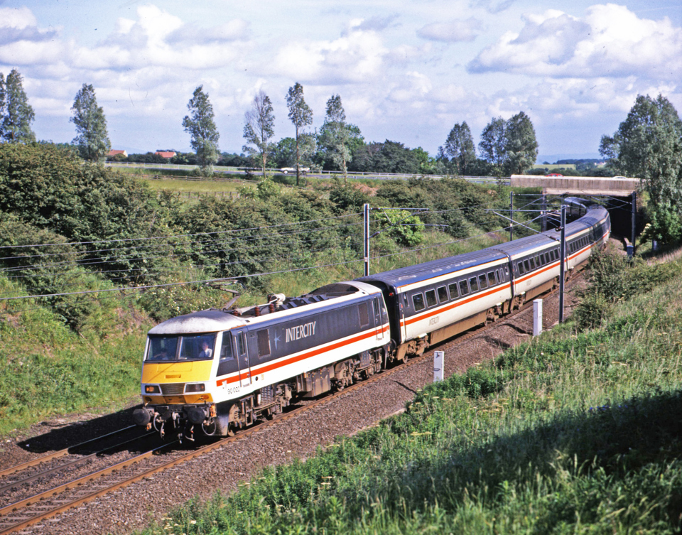 In InterCity livery, 90022 nears Aycliffe on June 16 1992. It is the first of the class to be scrapped. P J ROBINSON.