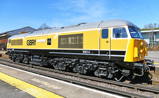 GB Railfreight 69014 EMD Longport, in its new livery, passes Basingstoke working the 1020 Eastleigh Works to Longport on March 20. MARK V PIKE.