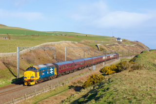 Scottish Railway Preservation Society’s 37403 Isle of Mull passes Lamberton (just north of the Scotland/England border on the East Coast Main Line) with the 0811 Edinburgh-Sunderland South Dock - the Branch Line Society’s ‘Tweedmouth Tractors’ charter - on April 8 2022. ROBIN RALSTON.
