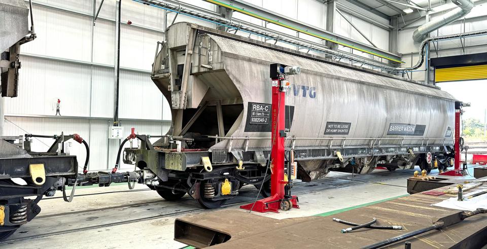 Former Polybulk wagons undergo conversion to barrier wagons at GBRf’s Peterborough wagon maintenance site on September 8. When completed, a repaint will follow. MEL HOLLEY.