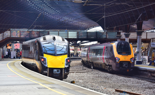 At York on April 20, Grand Central 180102 has arrived with the 1213 Sunderland-London King’s Cross, while CrossCountry 220018 and 221132 wait with the 1105 Edinburgh-Penzance.  STEVE WIDDOWSON.