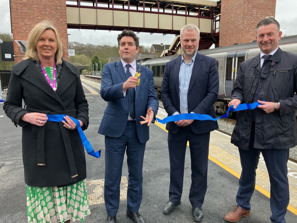 Rail Minister Huw Merriman cuts the ribbon alongside representatives from Network Rail, Northern and TransPennine