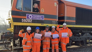 Some of the women responsible for managing and operating the 0220 Whatley Quarry-Theale freight train that ran on March 4. Above, driver Elizabeth Whettleton (Freightliner), then from left to right: Anita Bradfield – Mobile Operations Manager, Network Rail; Jess Lippett - Senior Regional Freight Manager, Network Rail; Joanne Edwards – Site Foreman, Heidelberg; Jessica Hannon - Assistant Rail Manager, Heidelberg ; Jemma Ringland – Operations Support Manager, Freightliner. NETWORK RAIL.
