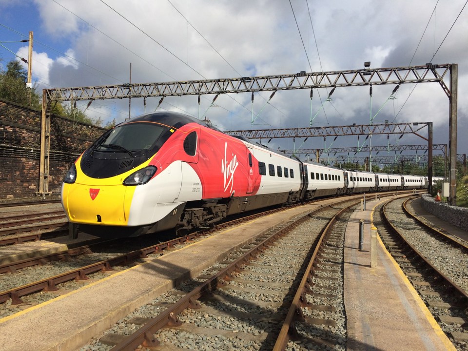 Virgin Trains 390010 The Cumbrian Spirit stands at Edge Hill, following its repaint by Alstom at its nearby Widnes facility. VIRGIN TRAINS.