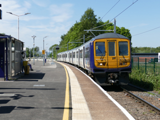 On May 14 769458 passes Ince with the 1208 Southport-Manchest OR.. From May 18, Ince will be the traction change poin. JO CLOUGH.JPG