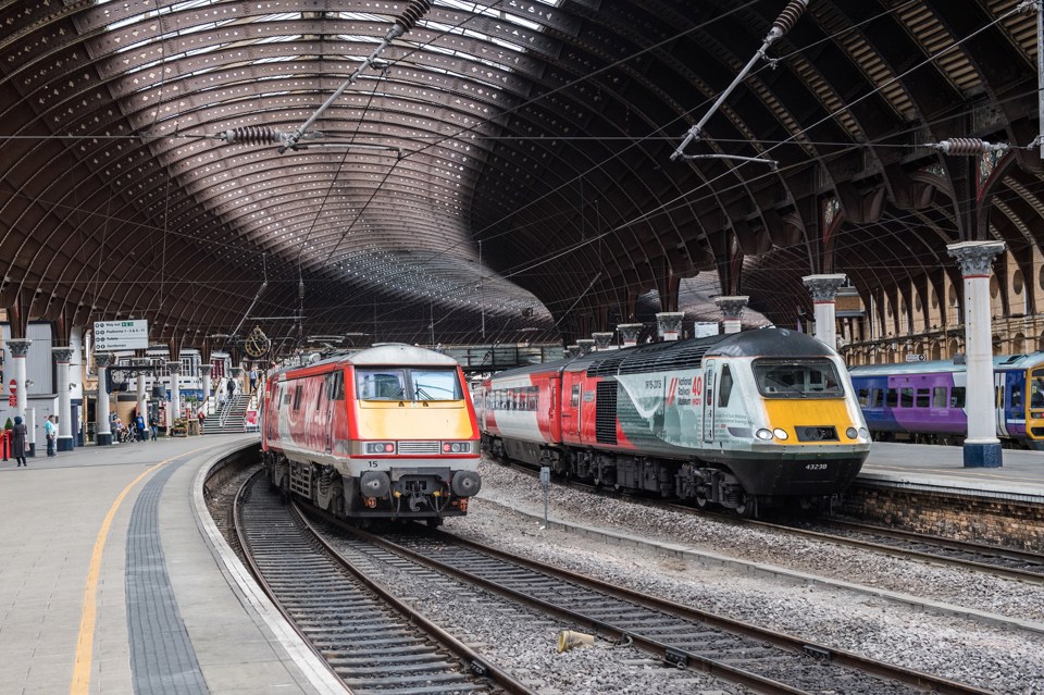 A VTEC Class 91 passes VTEC 43238 at York. JACK BOSKETT/RAILREVIEW.