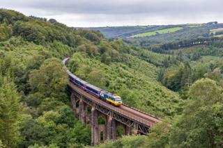 HST 43002 Sir Kenneth Grange powers over Largin Viaduct on August 6 2017. ALAMY.