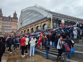 Large queues form at Lime Street station on May 26 after Liverpool FC’s parade, causing severe delays on the network.