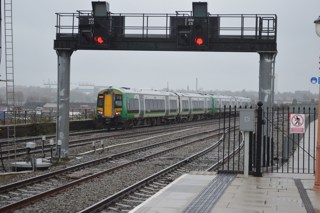 London Midland 172218 trails 172215 away from Birmingham Moor Street on December 30 2015. RICHARD CLINNICK.