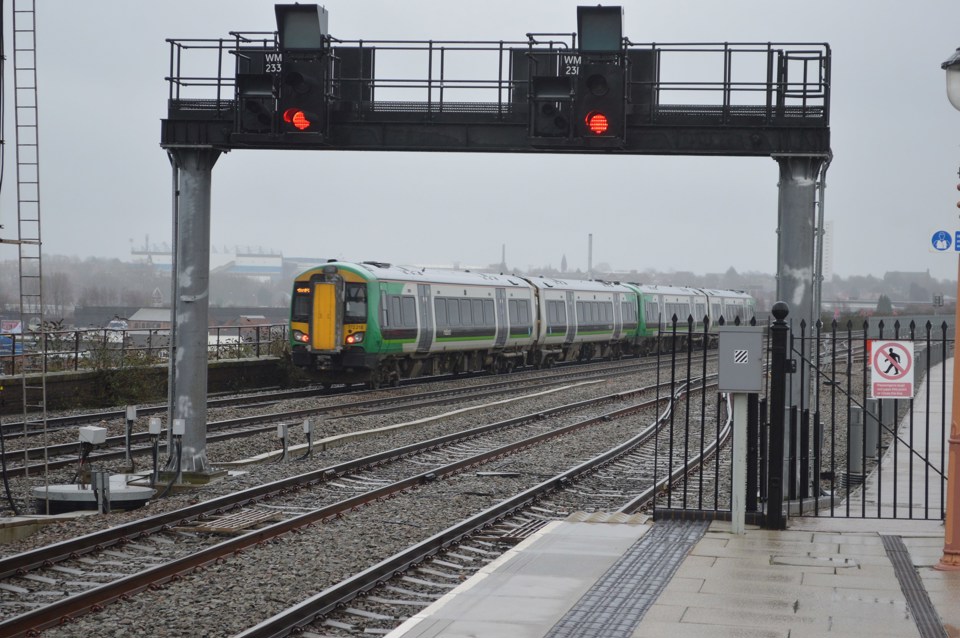 London Midland 172218 trails 172215 away from Birmingham Moor Street on December 30 2015. RICHARD CLINNICK.