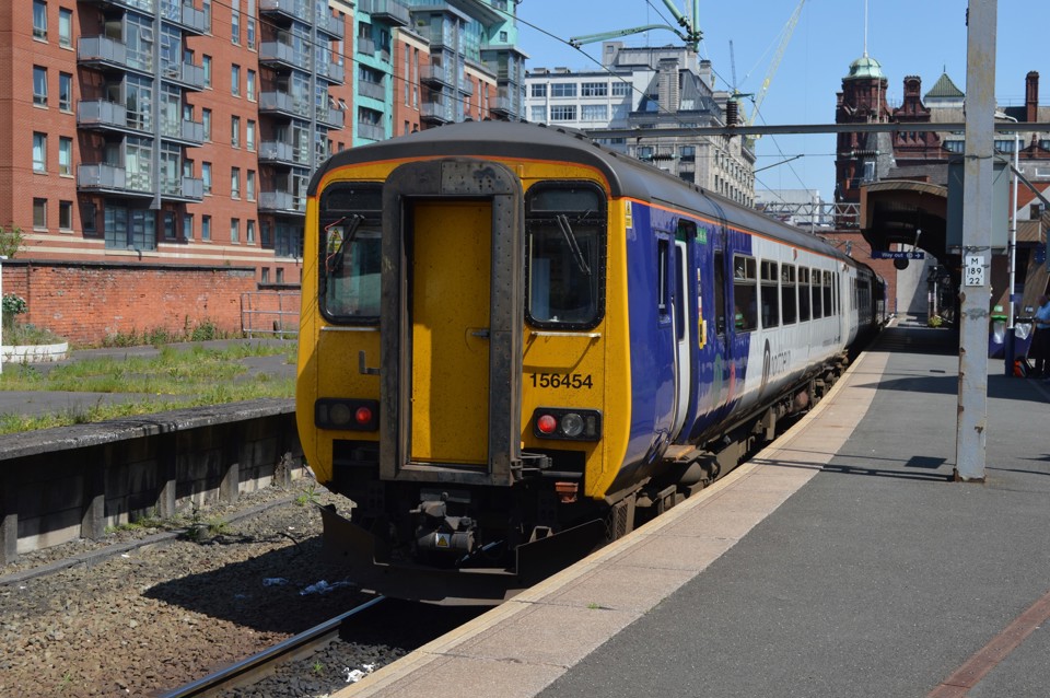 A Northern Rail Class 156 at Manchester Oxford Road station