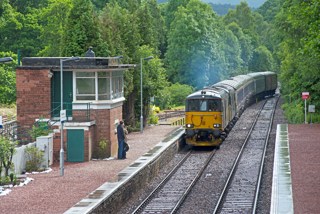 A pair of Caledonian Sleeper Class 73/9s enter Spean Bridge on July 1. PETER FOSTER.