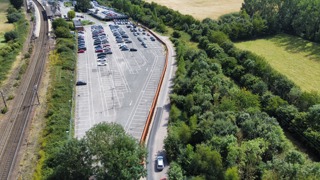 Manningtree station car park, with the steel wall visible in the middle. DEDHAM VALE SOCIETY.