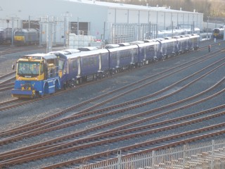 Three-car 385010 and 385009 stand oustide Newton Aycliffe on January 17, with DB Cargo 67002 just visible in the background. The ‘67’ had arrived to collect 385015 to take to Craigentinny. No Class 385 has yet entered passenger traffic, with ScotRail stating it was working hard to get them into service. JAMES GARTHWAITE.