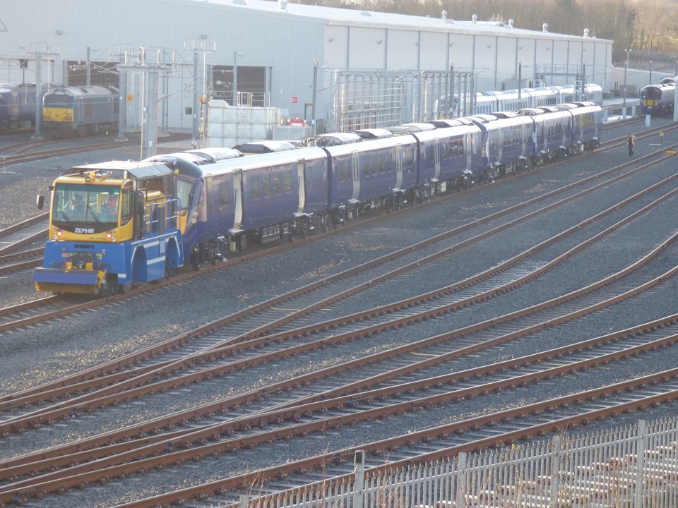 Three-car 385010 and 385009 stand oustide Newton Aycliffe on January 17, with DB Cargo 67002 just visible in the background. The ‘67’ had arrived to collect 385015 to take to Craigentinny. No Class 385 has yet entered passenger traffic, with ScotRail stating it was working hard to get them into service. JAMES GARTHWAITE.