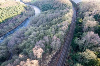 An aerial view of the major landslip at Eden Brows, which looks set to keep the S&C severed well into 2017 while Network Rail carries out extensive repairs. NETWORK RAIL.