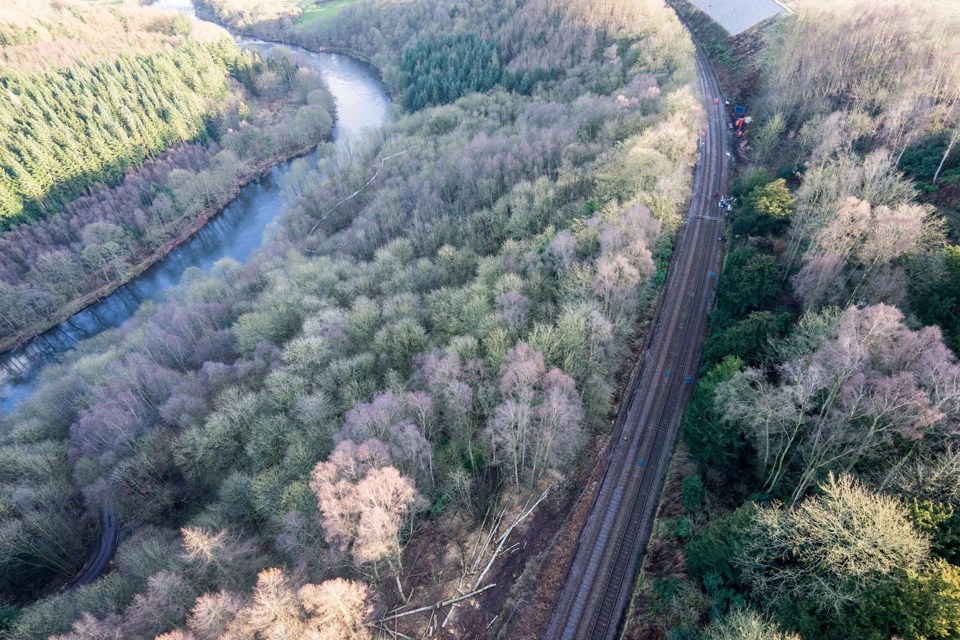 An aerial view of the major landslip at Eden Brows, which looks set to keep the S&C severed well into 2017 while Network Rail carries out extensive repairs. NETWORK RAIL.