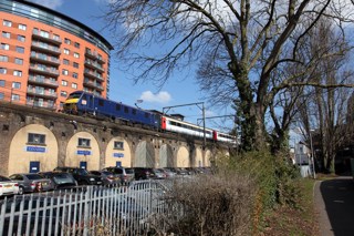 DB Cargo UK 90034 passes through Chelmsford at the helm of the 0930 Norwich-Liverpool Street on March 22. Faster journey times on the Great Eastern Main Line are called for by campaigners, but Network Rail has warned of the costs. ANTONY GUPPY.