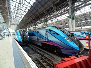 An artist's impression of First TransPennine Express AT300s at Manchester Piccadilly. FTPE.