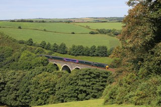GWR 57605 crosses Coombe Viaduct. CRAIG MUNDAY.