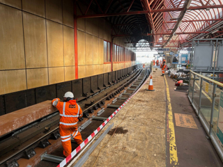 Timber replacement takes place at Portsmouth & Southsea station high-level platforms, for trains continuing to Portsmouth Harbour. NETWORK RAIL.