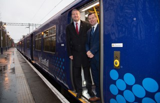 ScotRail Alliance Managing Director Phil Verster (left) and Scottish Transport Minister Derek Mackay at Milngavie on December 21. SCOTRAIL.