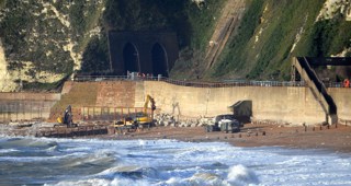 On December 31 2015, the clear slump and two main cracks in the sea wall conveying formation of the main Dover–London line outside Shakespeare Cliff Tunnel. DAVID STAINES.