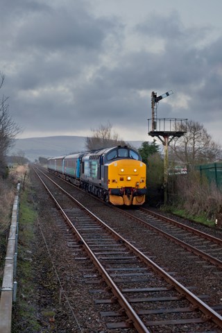 Direct Rail Services 37425 Sir Robert McAlpine/Concrete Bob passes Foxfield on the Cumbrian Coast on March 25, with the 0546 Barrow-in-Furness-Carlisle. ROBERT FRANCE.