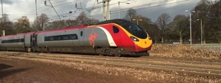 The 1051 Edinburgh-London Euston passes through the site of the floods north of Carlisle today (December 8). NETWORK RAIL.